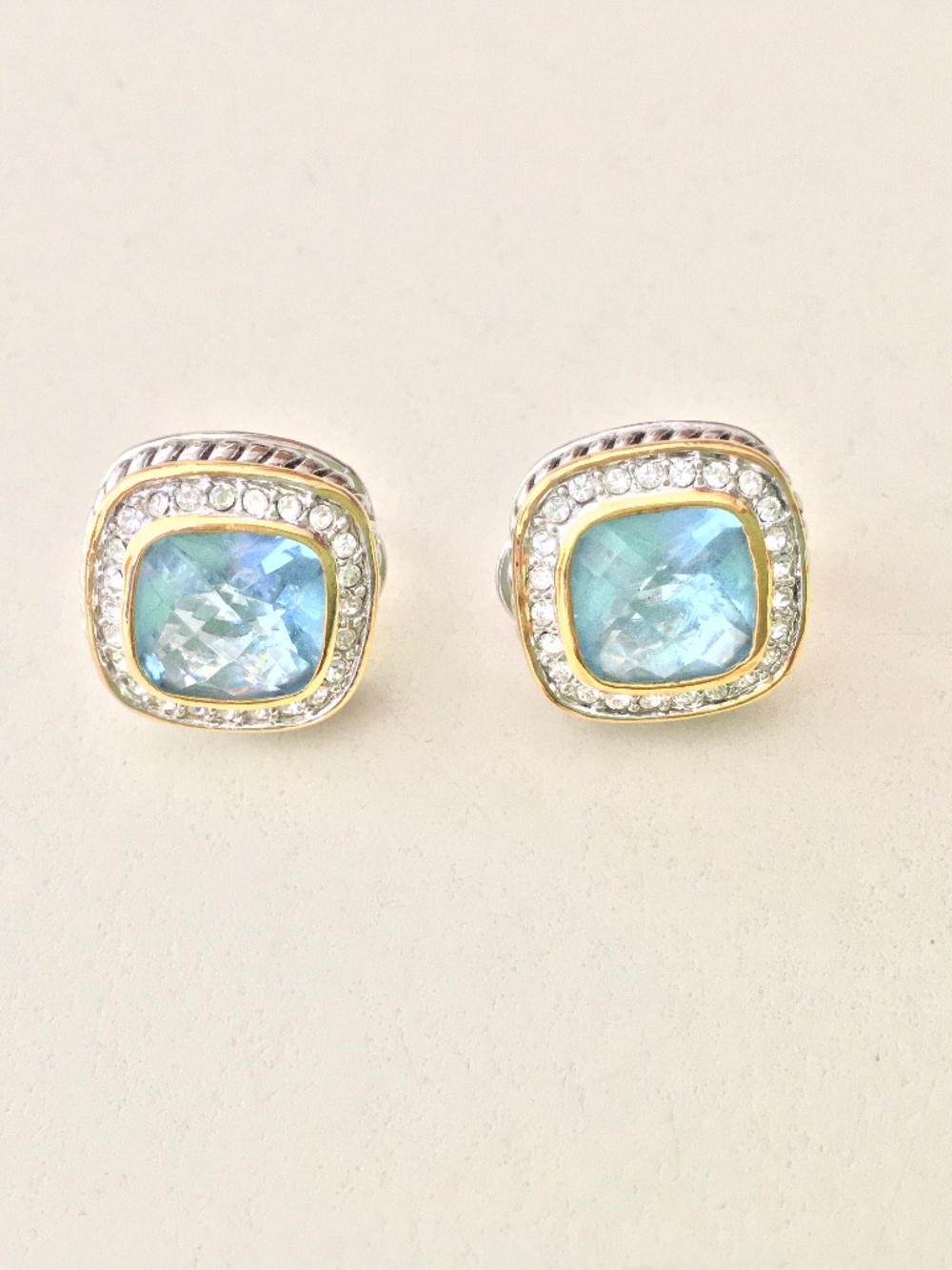 Brighton post earrings in silvertone/goldtone and blue stone